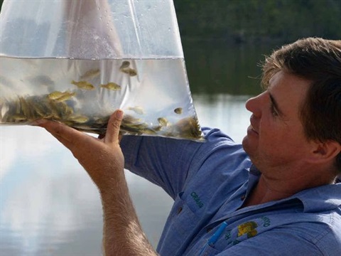 Craig-with-bag-of-fingerlings.jpg